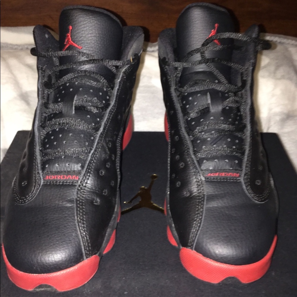 Black and red Air Jordan’s 13